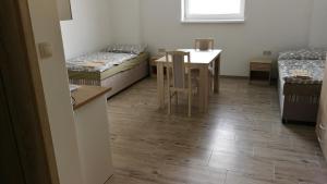 Postel nebo postele na pokoji v ubytování Apartmánové ubytovanie VKF