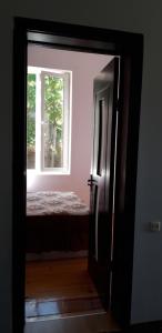 Postel nebo postele na pokoji v ubytování Mero House