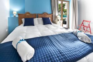 A bed or beds in a room at Relais Lo Stagnone