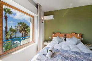 A bed or beds in a room at Relais Lo Stagnone
