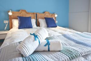 A bed or beds in a room at Relais Lo Stagnone