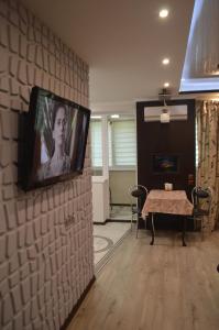 TV o dispositivi per l'intrattenimento presso 2 room Lux Apartment on Kulika Street