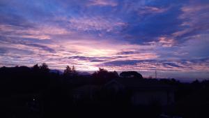 The sunrise or sunset as seen from a panziókat or nearby