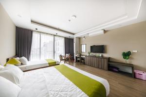 TV a/nebo společenská místnost v ubytování Hana 2 Apartment & Hotel Bac Ninh
