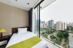 Postel nebo postele na pokoji v ubytování Hana 2 Apartment & Hotel Bac Ninh + 37 fotografií