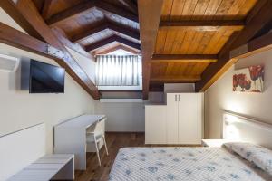 Postel nebo postele na pokoji v ubytování CASA MULINO
