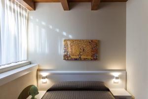 Postel nebo postele na pokoji v ubytování CASA MULINO