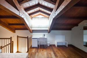 Postel nebo postele na pokoji v ubytování CASA MULINO