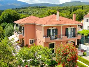 a house with a view of the mountains at Ntina's house in Karavomylos