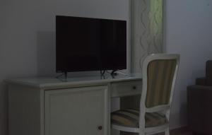 TV a/nebo společenská místnost v ubytování Vista D'amare