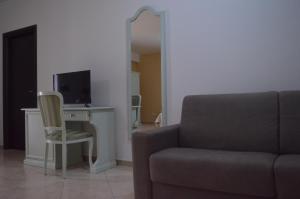 TV a/nebo společenská místnost v ubytování Vista D'amare