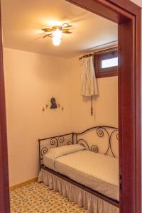 Postel nebo postele na pokoji v ubytování Villa Azzurra con vista sul mare