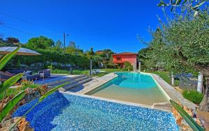 The swimming pool at or close to l' Acciuga Blu Még 21 kép