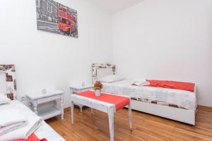 Postel nebo postele na pokoji v ubytování Guest House Zuber