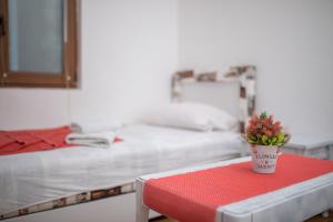 Postel nebo postele na pokoji v ubytování Guest House Zuber