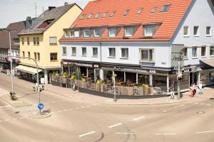 an overhead view of a city street with buildings at LOOK Hotel & Rooms in Crailsheim