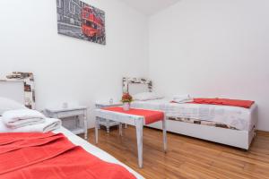 Postel nebo postele na pokoji v ubytování Guest House Zuber