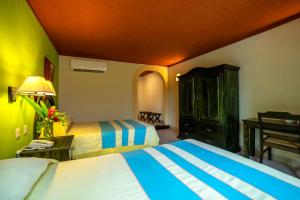 Katil atau katil-katil dalam bilik di Hotel Chichen Itza