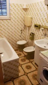Koupelna v ubytování Apartment Grubišić
