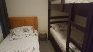 Postel nebo postele na pokoji v ubytování Departamento Serena II + 2 fotografie