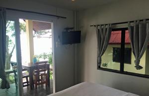 Postel nebo postele na pokoji v ubytování Sunrise Villas Seaview