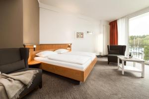 Postel nebo postele na pokoji v ubytování Hotel Spree-idyll + 37 fotografií