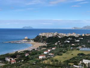 a view of a beach and the ocean at Casamediterranea in Sperlonga