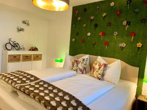 Letto o letti in una camera di Boutique Appartments AlteGreißlerei
