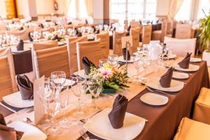 a table set up for a banquet in a banquet hall at Hotel Salambina in Salobreña