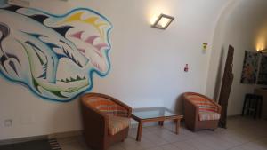Posezení v ubytování Seven Hostel & Rooms