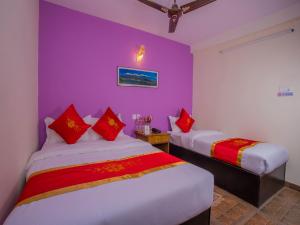 Letto o letti in una camera di Hotel Fewa Corner & Restro
