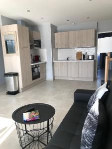 Η κουζίνα ή μικρή κουζίνα στο Appartement plein centre Saint Florent face au port