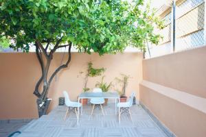 A patio or other outdoor area at MalagaUrbanRooms - Beach & Sea