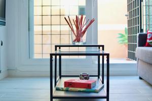 A seating area at MalagaUrbanRooms - Beach & Sea