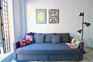 A seating area at MalagaUrbanRooms - Beach & Sea