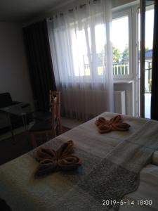 Postel nebo postele na pokoji v ubytování Villa Eleven