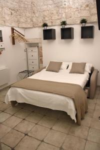 Posteľ alebo postele v izbe v ubytovaní Pietralta