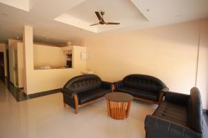 A seating area at Hotel Wayanad Square