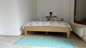 Postel nebo postele na pokoji v ubytování Apartments ZP44