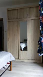 Postel nebo postele na pokoji v ubytování Apartments ZP44