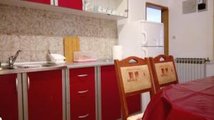 Kuchyň nebo kuchyňský kout v ubytování Apartments ZP44