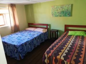 Ліжко або ліжка в номері Aventura Chachapoyas Backpackers