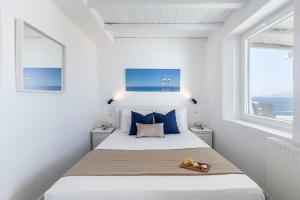 Posteľ alebo postele v izbe v ubytovaní Villa Tonic by Mykonos Mood