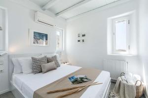 Posteľ alebo postele v izbe v ubytovaní Villa Tonic by Mykonos Mood