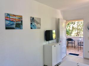 TV a/nebo společenská místnost v ubytování Apartment Pin