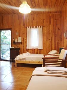 Postel nebo postele na pokoji v ubytování Portalimo Lodge Hotel - Adult Only +12