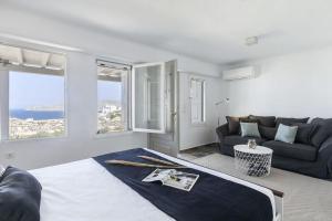 Posteľ alebo postele v izbe v ubytovaní Villa Tonic by Mykonos Mood