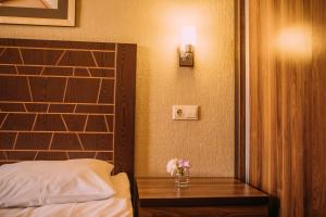 Letto o letti in una camera di Kantar Hotel