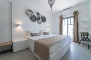 Llit o llits en una habitació de Black Coast Santorini
