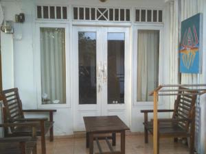 Balkón nebo terasa v ubytování Syifa Homestay
